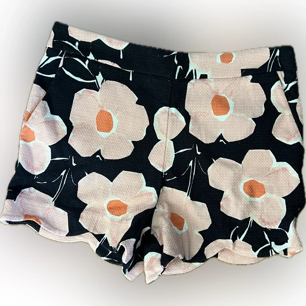 Anthropologie Navy, Pink and Coral Floral Scallop-Hem Shorts with side zipper.